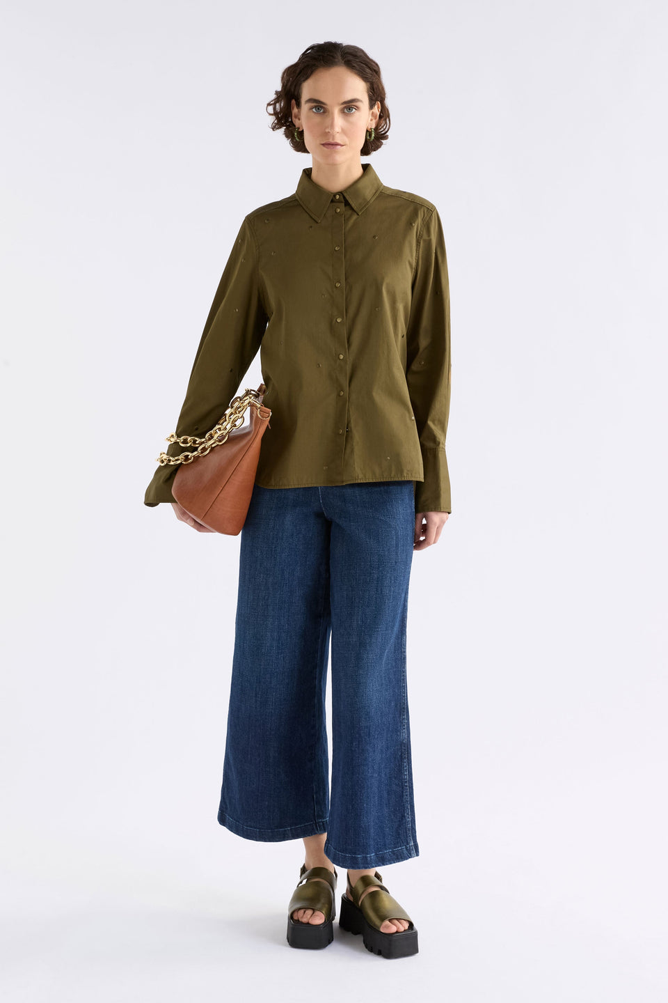 Stuud Organic Cotton Long Sleeve Shirt with all over stud detail Model Front full Body with bag | OLIVE