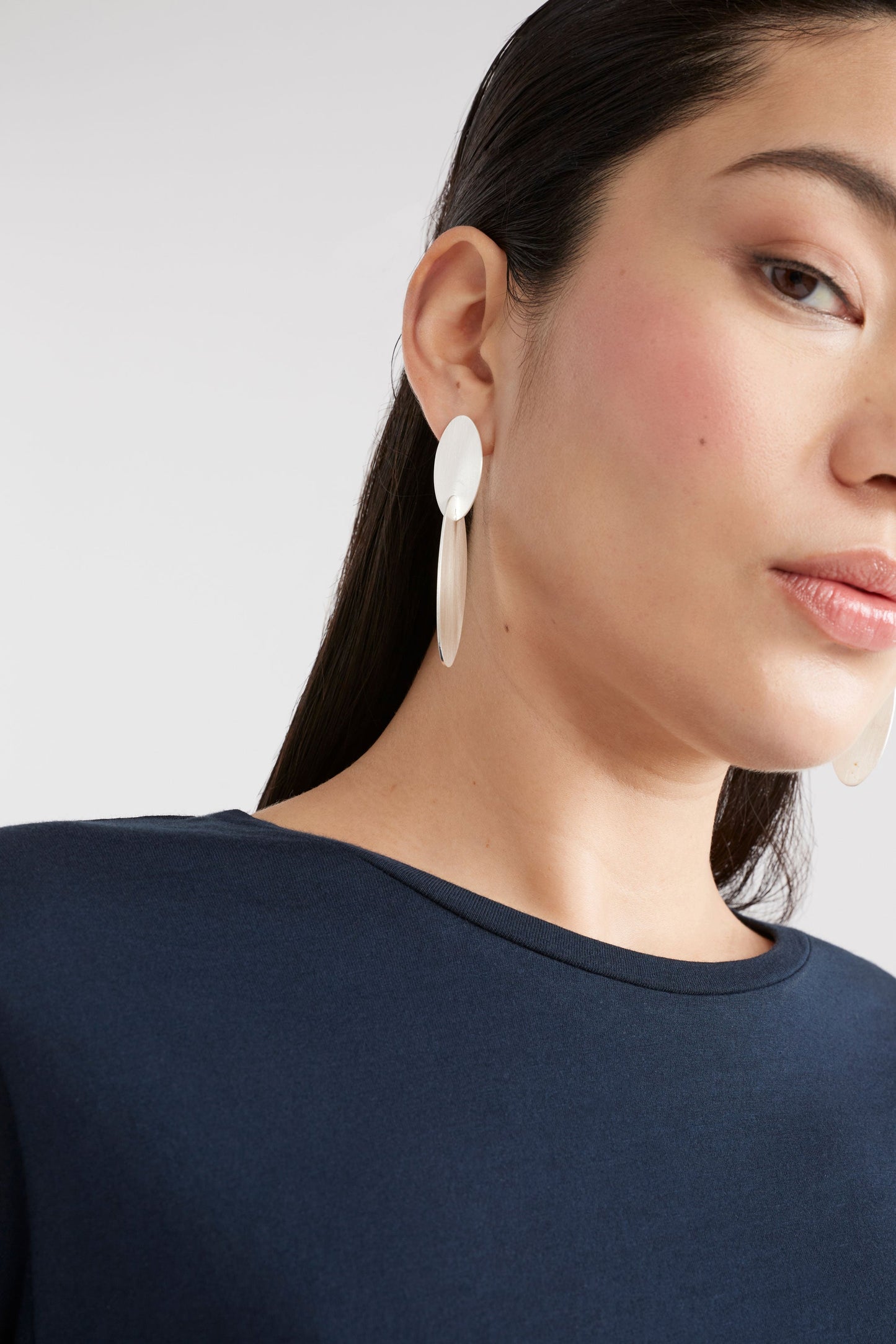 Staas Brushed Matt Metal Oval Drop Earring Model Crop | SILVER