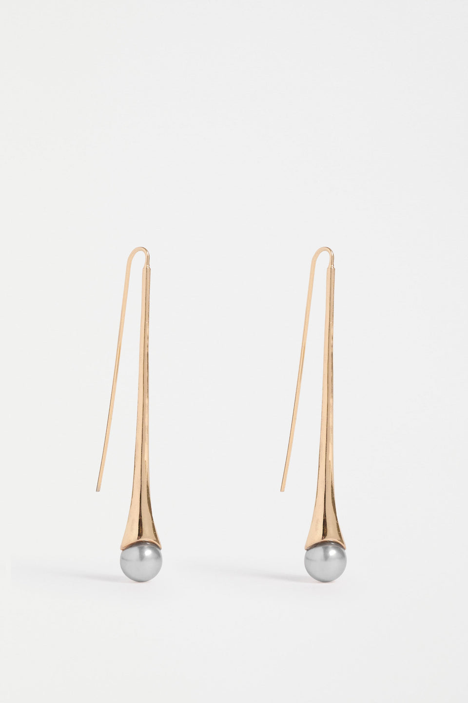 The Orbyn Drop Earring showcases an elongated stem with a faux pearl bead, offering a refined and elegant hook silhouette | GOLD