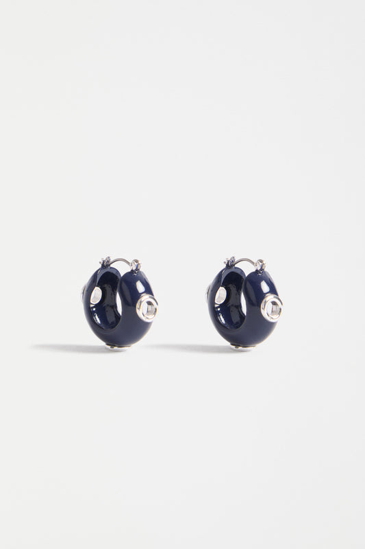 The Jans Hoop Earring features a chunky mini hoop silhouette with glossy enamel and metallic rivet detailing for a bold, playful finish | BRIGHT NAVY