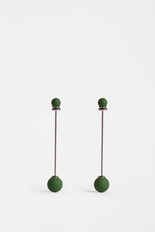 The Sarra Drop Earring features a slender chain with a small bead at the ear and a larger bead drop, creating elegant, lightweight movement | GUNMETAL