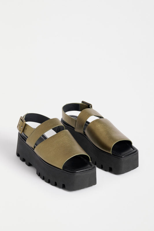 Jyrti Platform Sandal Shoe Flat Lay side view | OLIVE