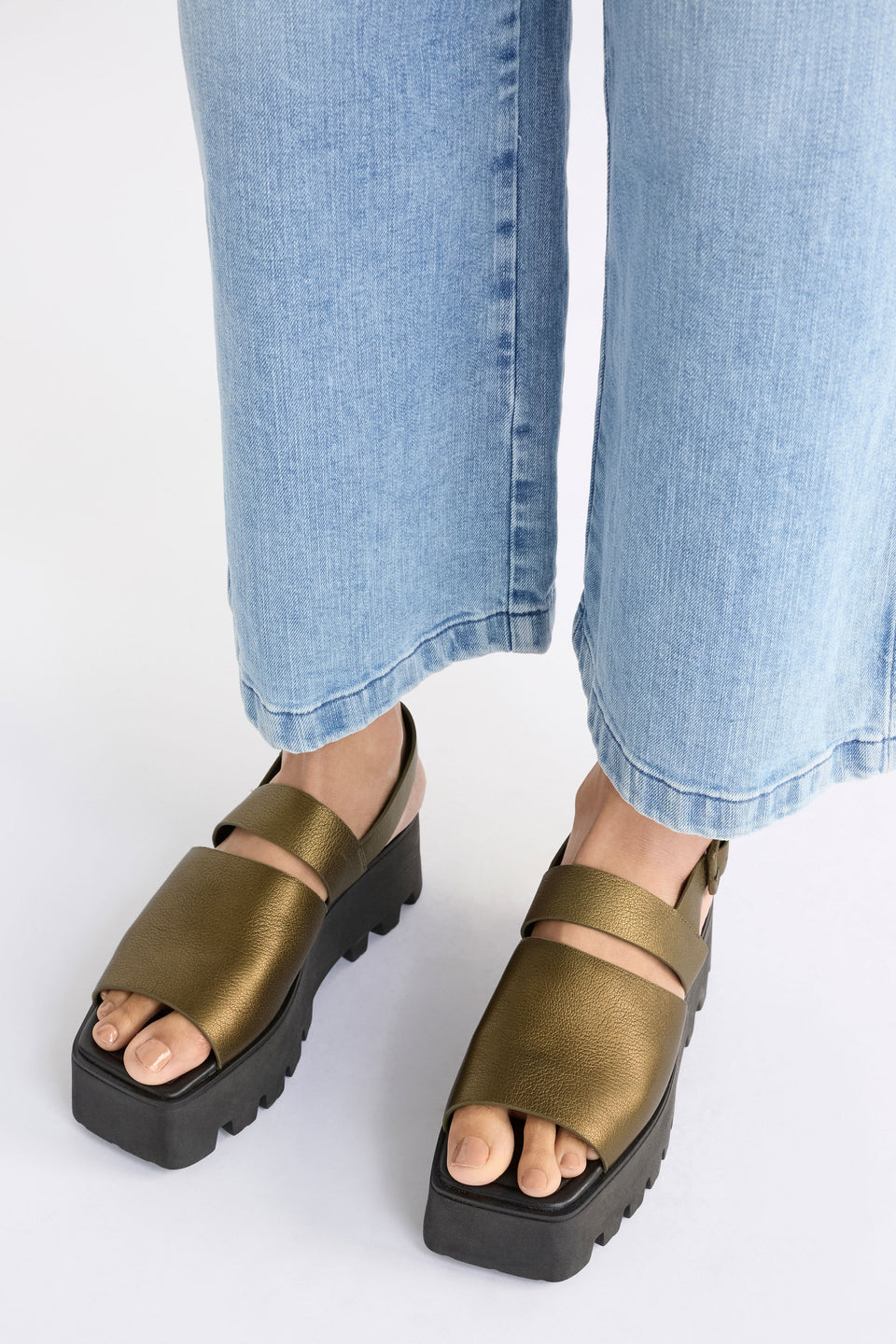 Jyrti Platform Sandal Shoe on model front view | OLIVE