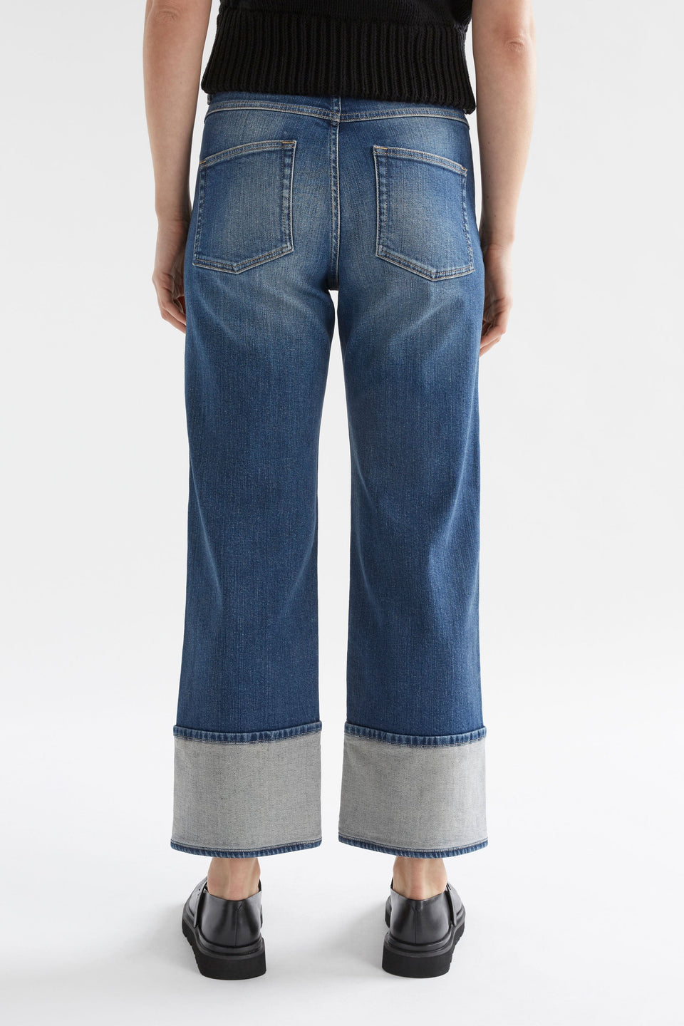 Modell Wide Straight Leg Organic Cotton Stretch Cuff Jean Model Back | FADED INDIGO