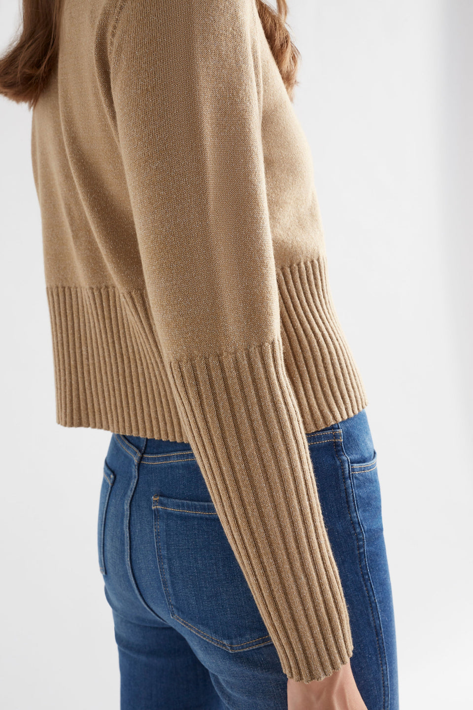 Finby Metallic Merino Round Neck Ribbed Cardigan Model Side Detail | TAUPE GOLD