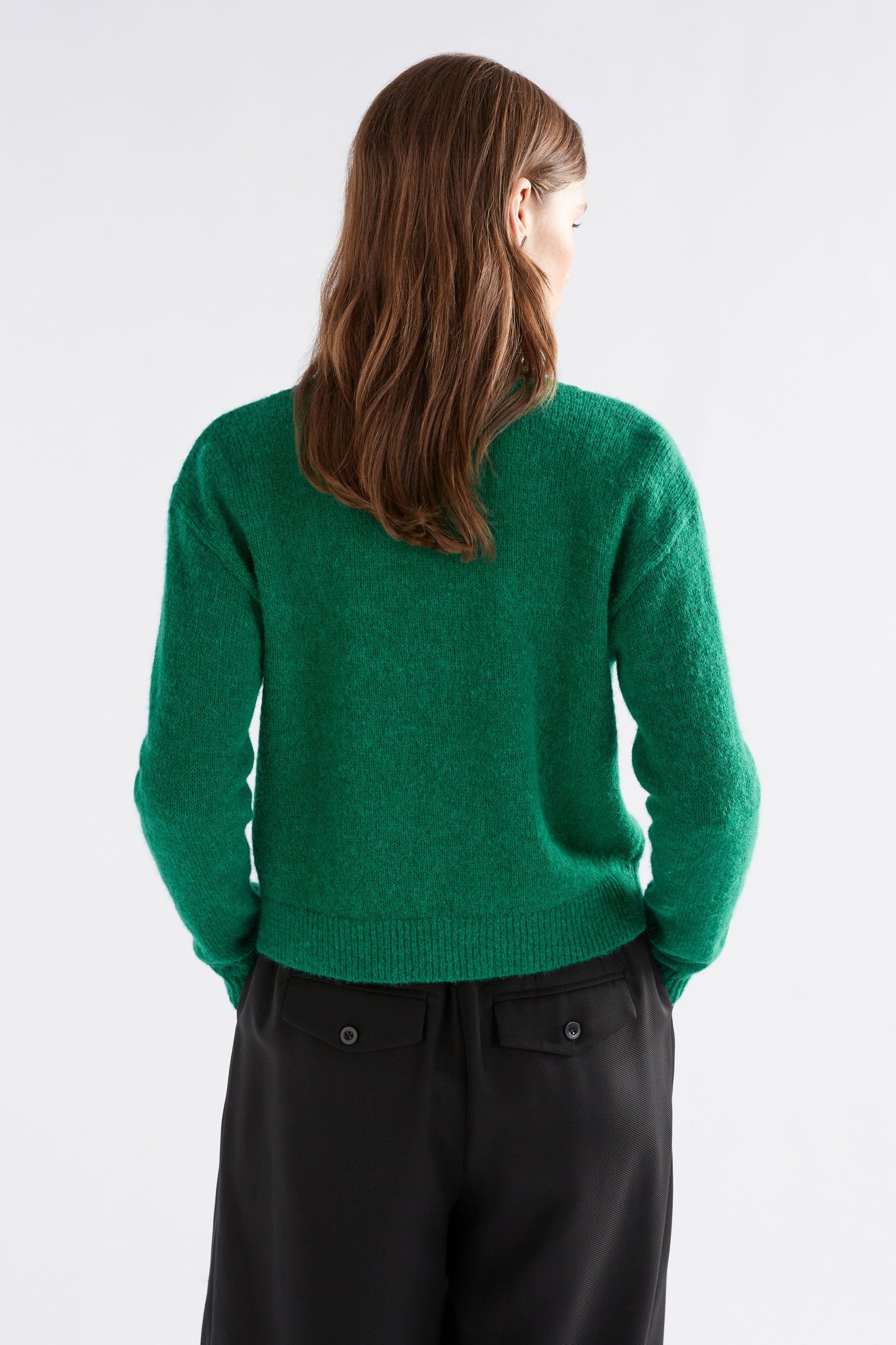 Daaru Alpaca Merino V neck Cardigan Model Angled Back | MILAN GREEN