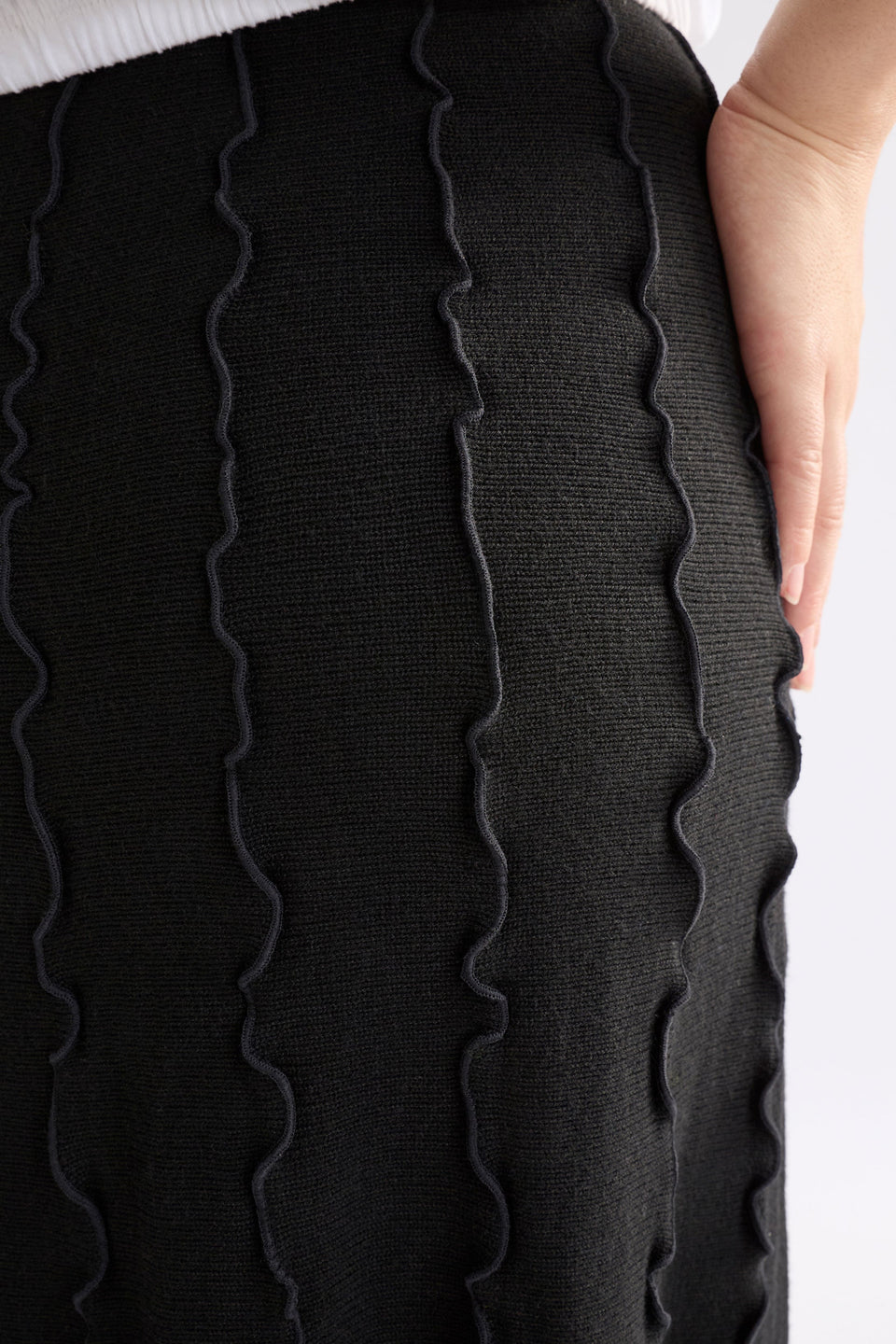 Musse Merino Wool Blend Knit Midi Skirt with Wiggle Textured Stripes Model  Front detail | BLACK