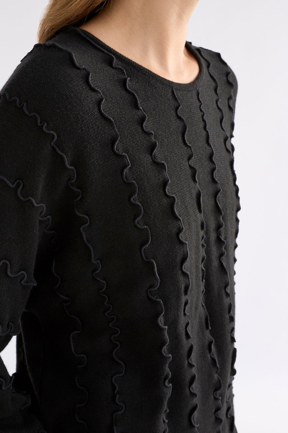Musse Merino Wool Blend Knit Sweater with Wiggle Textured Stripes Model  Front detail | BLACK
