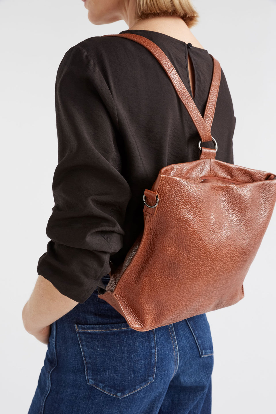 Nuoli Mini Leather Transformable Backpack to Crossbody Bag On Model Detail  | TAN