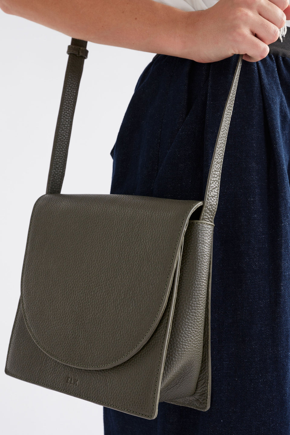 Sejer Structured Leather Crossbody Bag with Flap Closure Front model | OLIVE