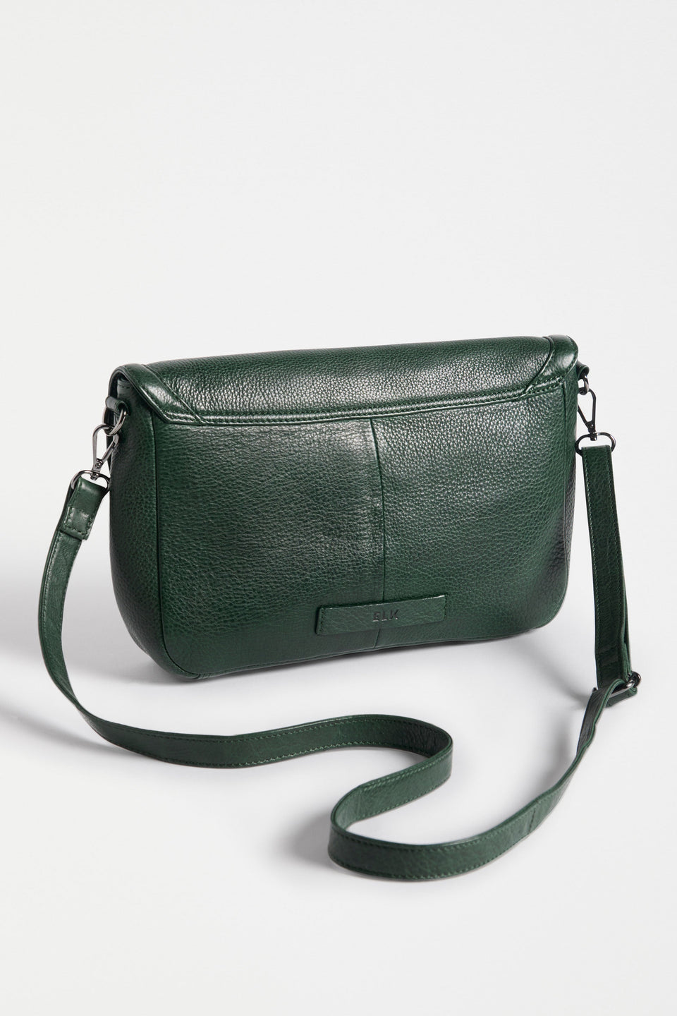 Unden Crossbody Bag Flat Lay Back View strap and elk logo detail | FOREST GREEN