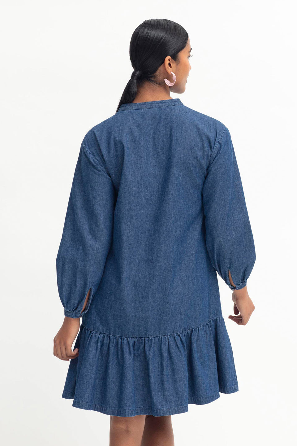 Jins Dropped Waist Ruffle Hem Long Sleeve Collarless Denim Dress Model Back | INDIGO