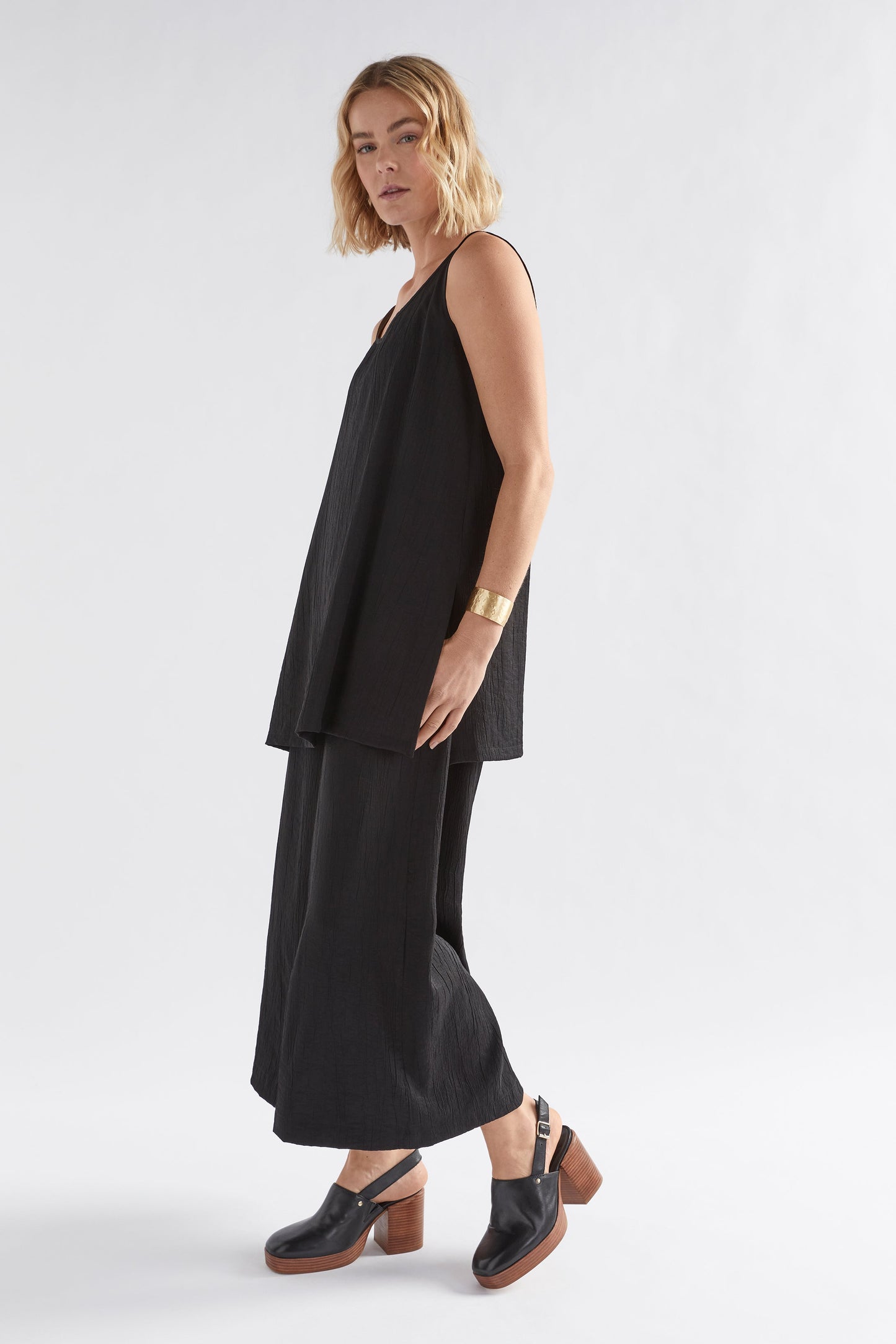 Joen Crinkle Fabric Tunic Top Model Angled Front full body | BLACK