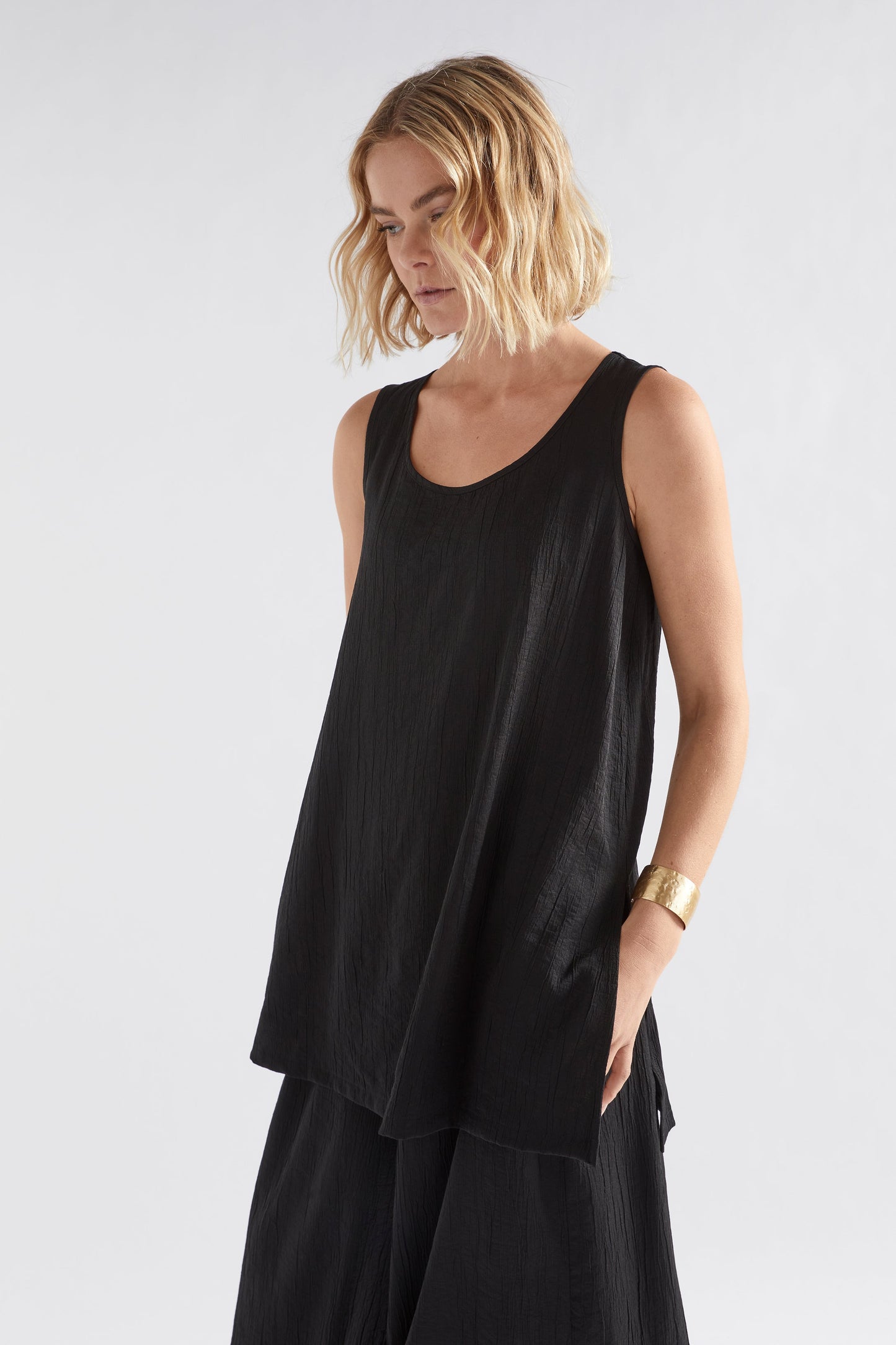 Joen Crinkle Fabric Tunic Top Model Angled Front | BLACK