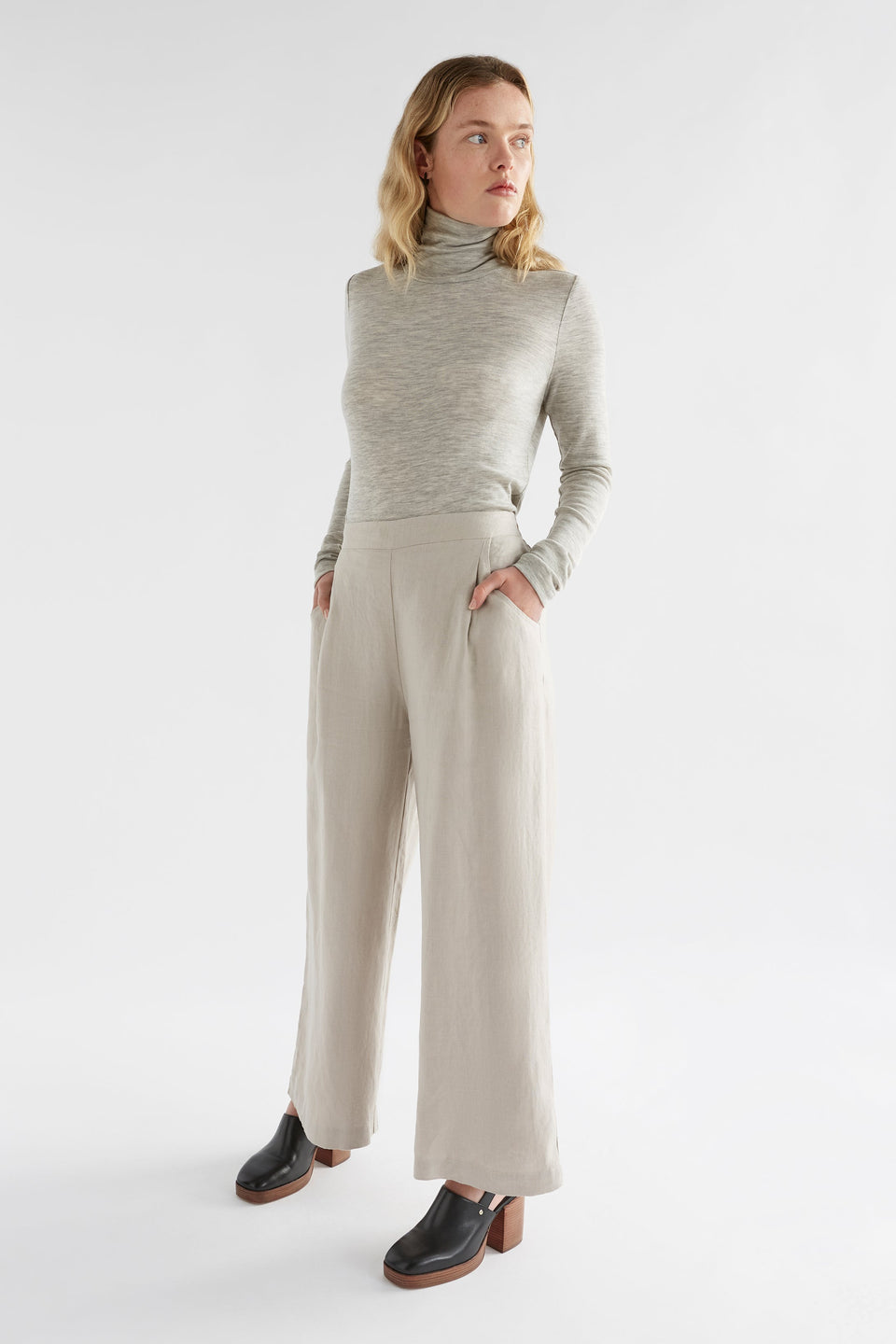 Merino Lightweight Long Sleeve Skivvy Model Angled Front Full Body | GREY
