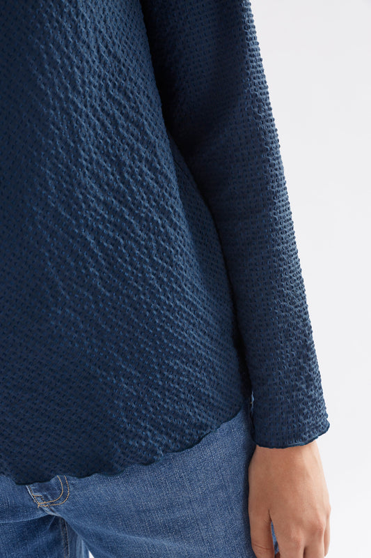 Deor Textured Mock Neck Lettuce Hem Long Sleeve Top Model Front Detail| DEEP SEA BLUE
