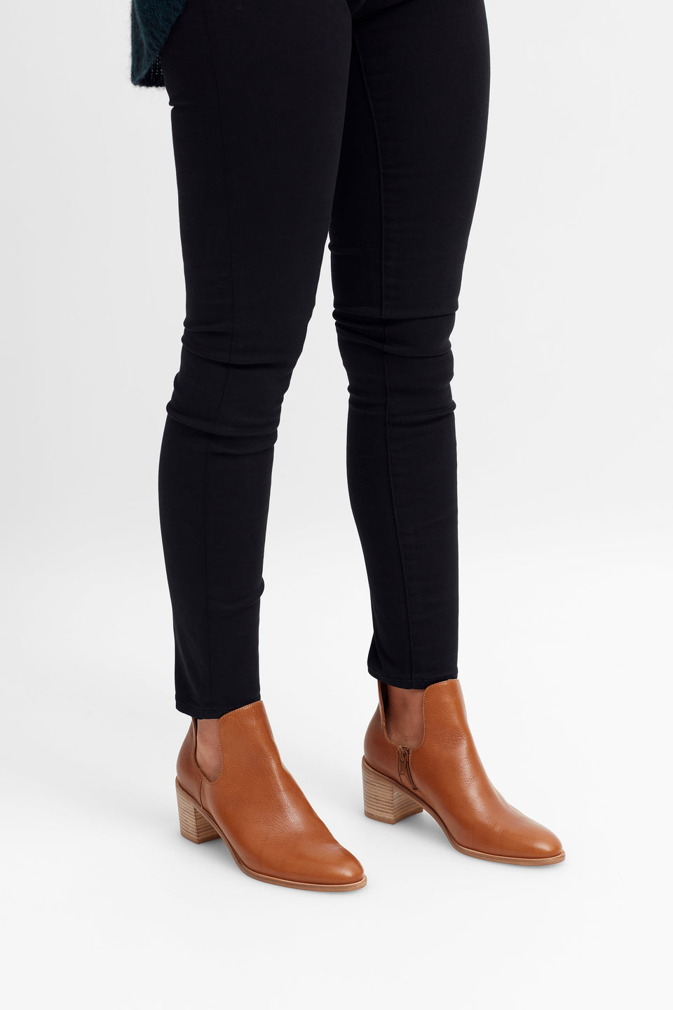 Valla Cut Out Heeled Leather Boot Model Angled Front | TAN