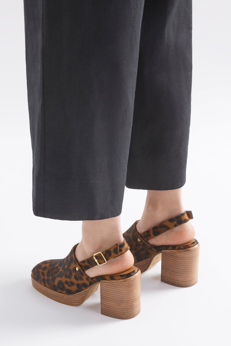 Stockholm Chunky Heel Slip on Clog with Back Strap in Animal Print Angled Back Model | ANIMAL PRINT