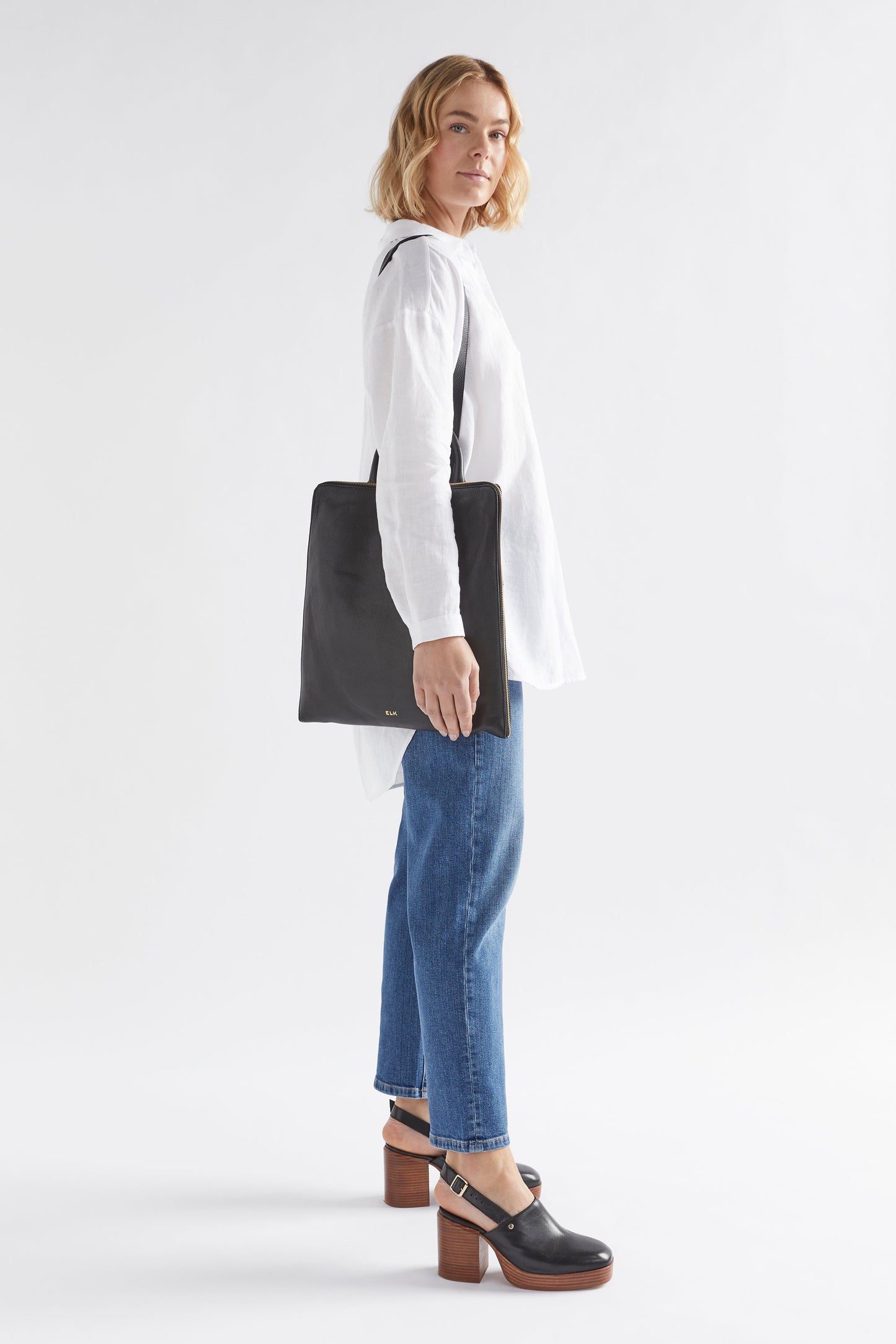 Sindal Minimalistic Leather Backpack Front as tote full body BLACK
