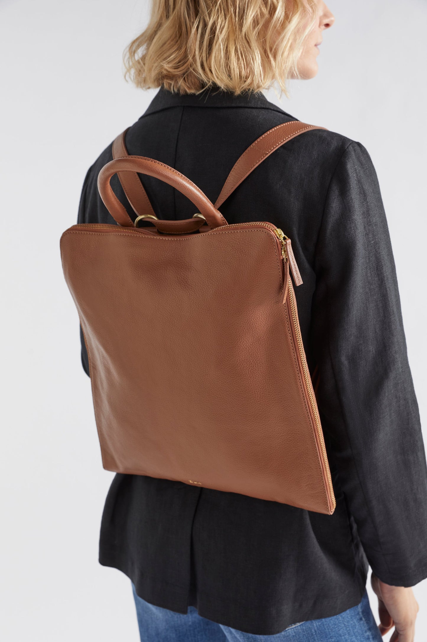 Sindal Minimalistic Leather Backpack Front on back TAN