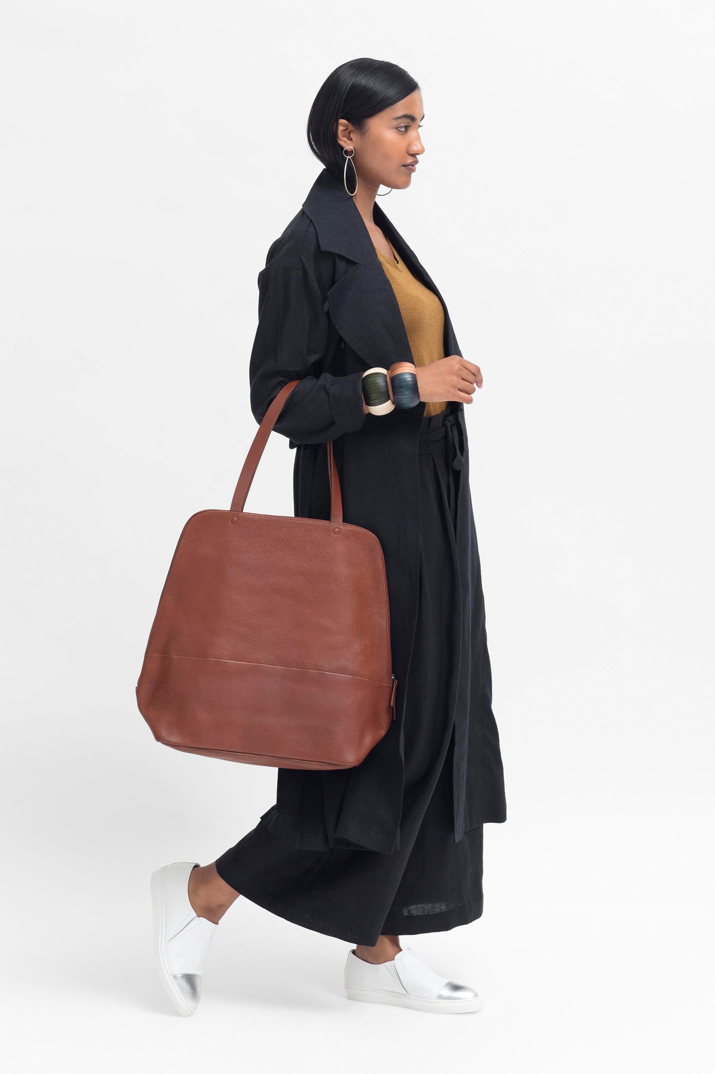 Arien Zip Up Leather Carry-All Bag Front model full body  | Tan